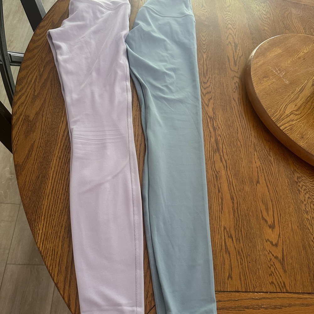 Lululemon gorgeous spring colors, Blue and Light purple 28” inseams leggings.